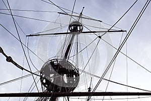 Detail of a sailboat rigging. Mast on traditional sailboats. Mast of large wooden ship.