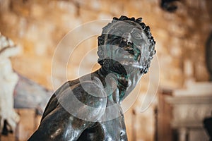 Detail from Satyr bronze statue 1575 of Giambologna, in Neptune fountain Piazza della Signoria, Florence