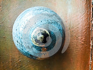 Detail of screw, Rust with Circle, Metal, steel, brilliant bolt in an orange wooden board