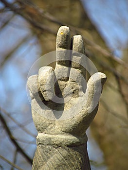 Detail of sculpture of Saint Procopius of Sazava, swearing hand, Bohemian canon and hermit, baroque statue in the open