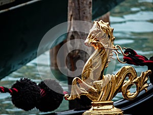 Detail of a seahorse from a gondola in venice.