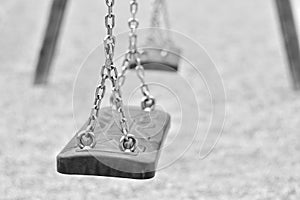 Swing on a playground photo