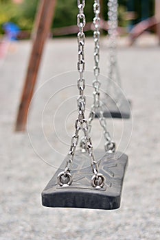 Swing on a playground photo