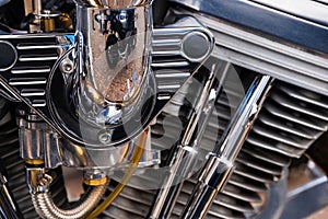 Detail of shiny chrome motorbike engine block