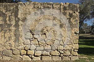 Old worn sandstone wall