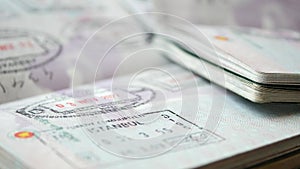 detail shot of Visas, stamps, seals in the passport.