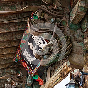 Detail and Sign of Entrance Gate, Daeungjeon, of Korean Buddhistic Temple Beomeosa on a foggy day. Located in Geumjeong, Busan,