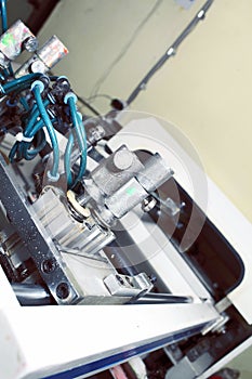 Detail of silk-screen printing machine