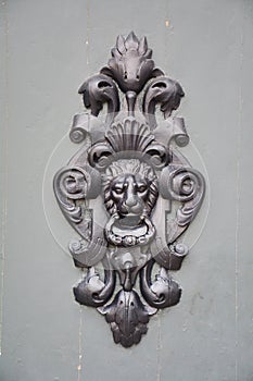 Detail of a silvered door in Cividale, Italy, Europe