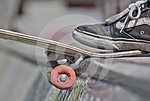 Detail of skater foot on skateboard