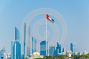 Detail of skyscrapers in Abu Dhabi with the local flag, UAE...IMAGE
