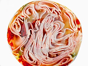 Detail of sliced ham in aspic, one circle, nice structure and texture