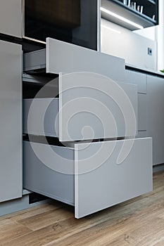 Detail of sliding shelves of cabinet