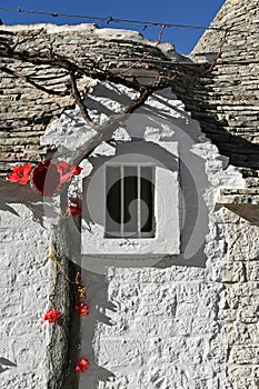 Detail of a small window of a trullo house in Alberobello, Apulia - Italy