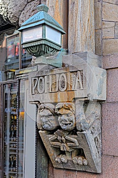 Detail from soapstone carvings flanking main entrance to Pohjola Insurance Company building Helsinki Finland photo