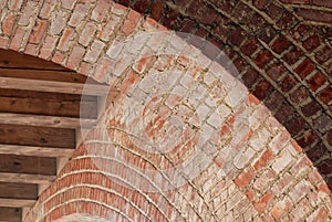 Detail of some arches in an arcade structure.