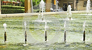 Detail of the spouts of the ornamental fountain in the Plaza de Virrey Amat in Barcelona photo