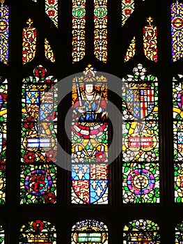 Detail  in the stained glass windows of Hampton Court Palace, UK 