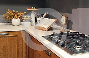 Detail of stainless burners in a elegant country kitchen photo