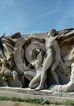 Detail of the statuary group `Youth` by Pierre Poisson