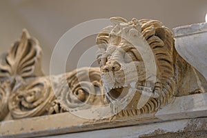 Detail of the statue of a lion lying in the archaeological site of Epidaurus photo