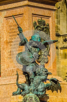 detail of a statue of saint george killing a dragon in german city munich...IMAGE