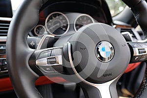 Detailed view of a luxury, german-made sports car showing detail from the drivers point of view.