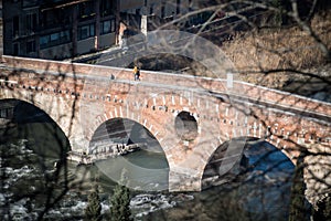 Detail of stone bridge, the famous ancient Roman bridge that crosses the Adige river in Verona, Italy