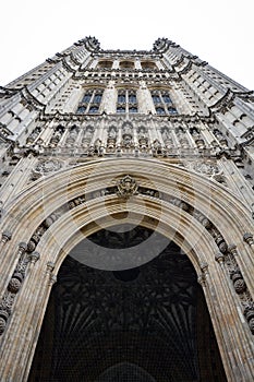 Detail of the stonework of the Victoria Tower above the Sovereigns Entrance to the Houses   of Parliament in London, England photo
