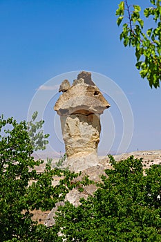 A detail from the structure of Cappadocia. Impressive fairy chimneys of sandstone in the canyon near Cavusin village, Cappadocia.