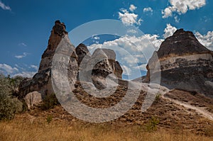 A detail from the structure of Cappadocia. Impressive fairy chimneys of sandstone in the canyon near Cavusin village, Cappadocia.