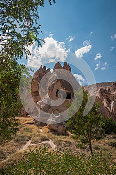 A detail from the structure of Cappadocia. Impressive fairy chimneys of sandstone in the canyon near Cavusin village, Cappadocia.