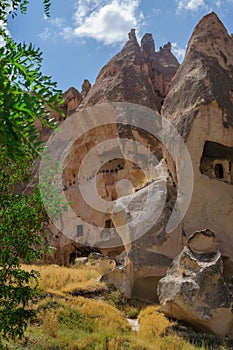 A detail from the structure of Cappadocia. Impressive fairy chimneys of sandstone in the canyon near Cavusin village, Cappadocia.