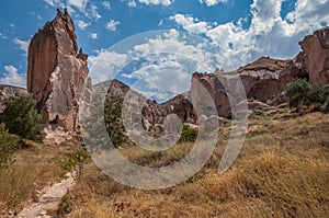 A detail from the structure of Cappadocia. Impressive fairy chimneys of sandstone in the canyon near Cavusin village, Cappadocia.