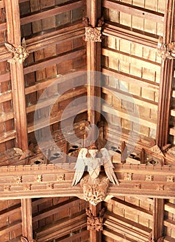 Detail of structure and decoration of wooden medieval church roof interior