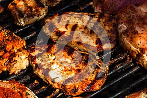 Detail of tasty pork steak on rustic background