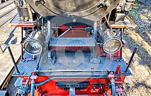 Detail of the technology of a steam locomotive at the station