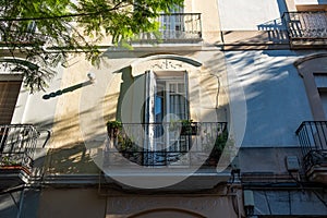 Detail of a terrace or balcony of an old building in Barcelona, Spain. Example of traditional architecture