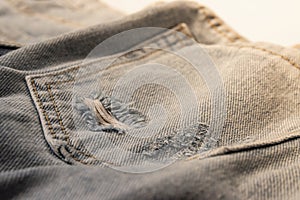 Detail,Texture of the old torn blue jeans