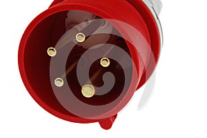 Detail of three phase electric plug connector, red plastic shell, white background