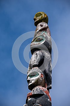 Detail of a Tlingit totem pole in Sitka, Alaska photo