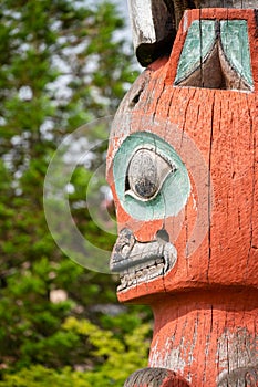 Detail of a Tlingit totem pole in Sitka, Alaska photo