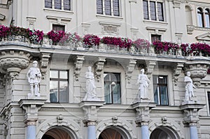 Detail of Town hall facade in Graz, Austria. Allegorical representation of Art, Science, Commerce and Industry
