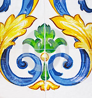 Detail of the traditional tiles from facade of old house.