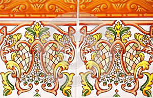 Detail of the traditional tiles from facade of old house. Decorative tiles.Spain traditional tiles. Floral ornament. Majolica, Wat