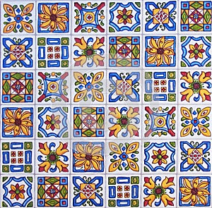 Detail of the traditional tiles from facade of old house. Decorative tiles.Valencian traditional tiles. Floral ornament.