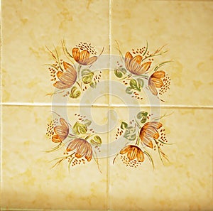 Detail of the traditional tiles from facade of old house. Decorative tiles.Valencian traditional tiles. Floral ornament. Majolica, photo