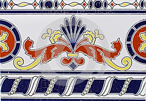 Detail of the traditional tiles from facade of old house. Decorative tiles.Valencian traditional tiles. Floral ornament. Majolica, photo