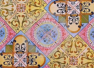 Detail of the traditional tiles from facade of old house. Decorative tiles.Valencian traditional tiles. Floral ornament. Spain