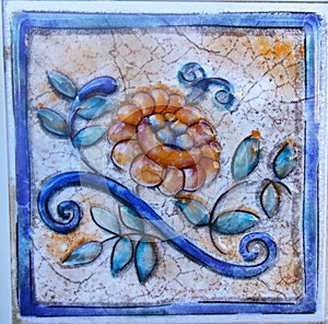 Detail of the traditional tiles from facade of old house . Spain